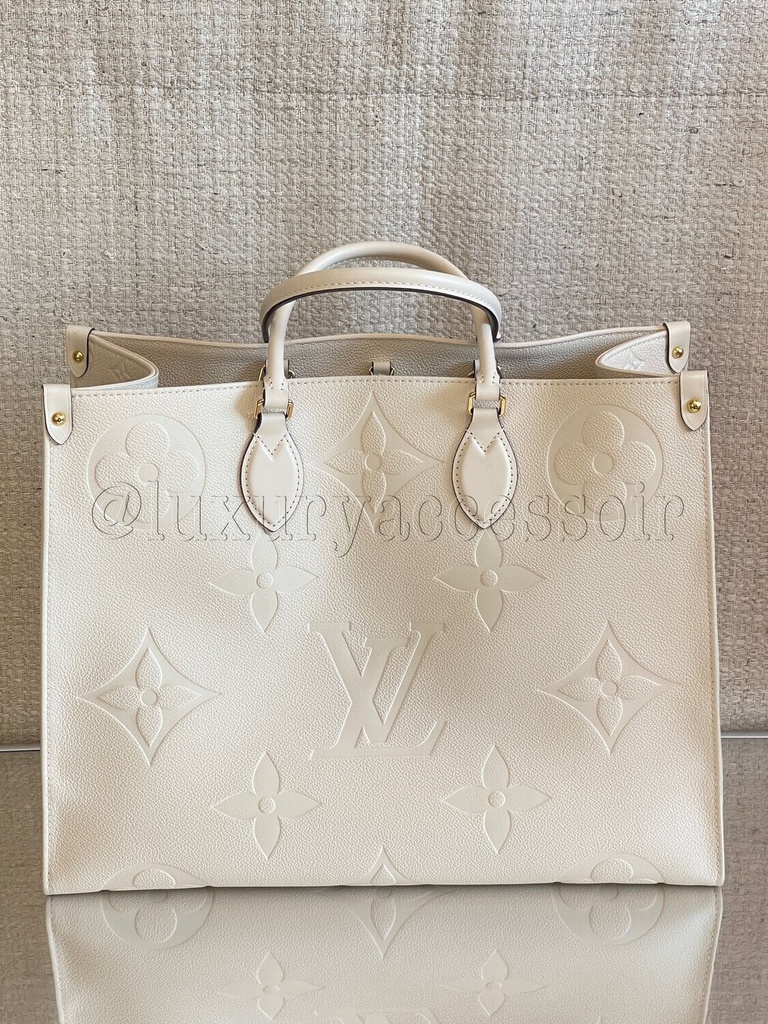 100 Original Louis Vuitton Onthego GM Empreinte creme cream